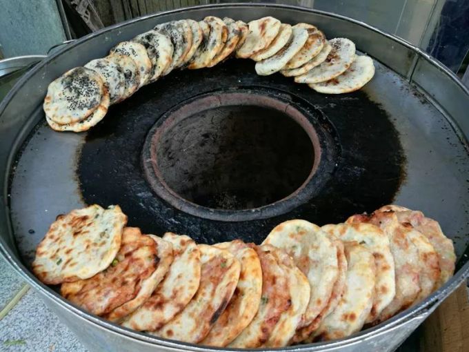 摆摊卖烧饼挣钱吗_挣钱烧饼摆摊卖什么好_摆摊卖烧饼赚钱吗
