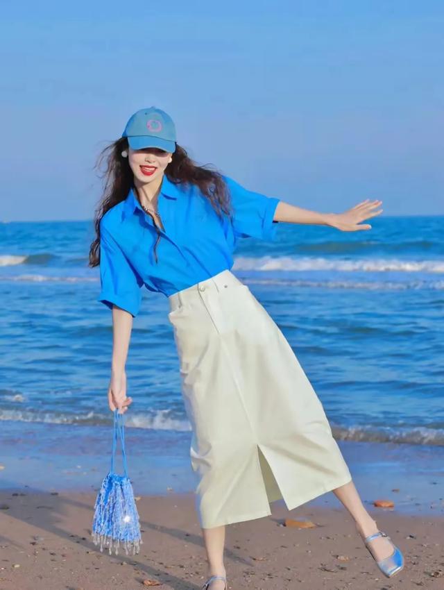 女式风衣可以内搭包包裙吗_裙子配包包_裙子搭风衣的好处